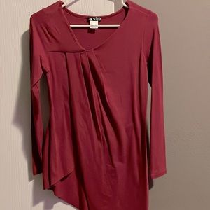 Long sleeve angled dress top in burgundy by Venus. Slight angle at bottom.